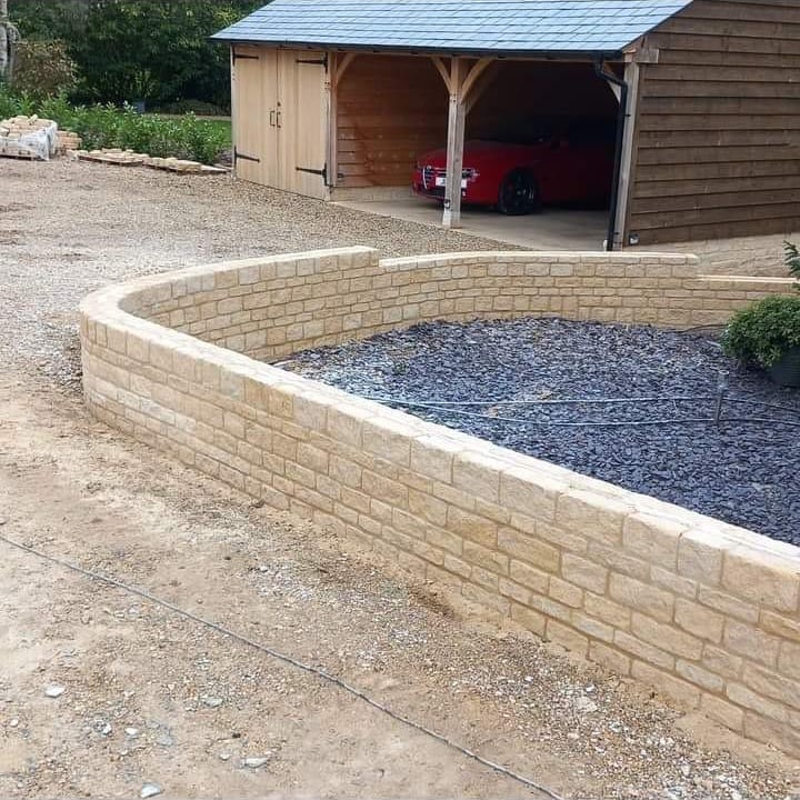 Stone front entrance with oak porch
